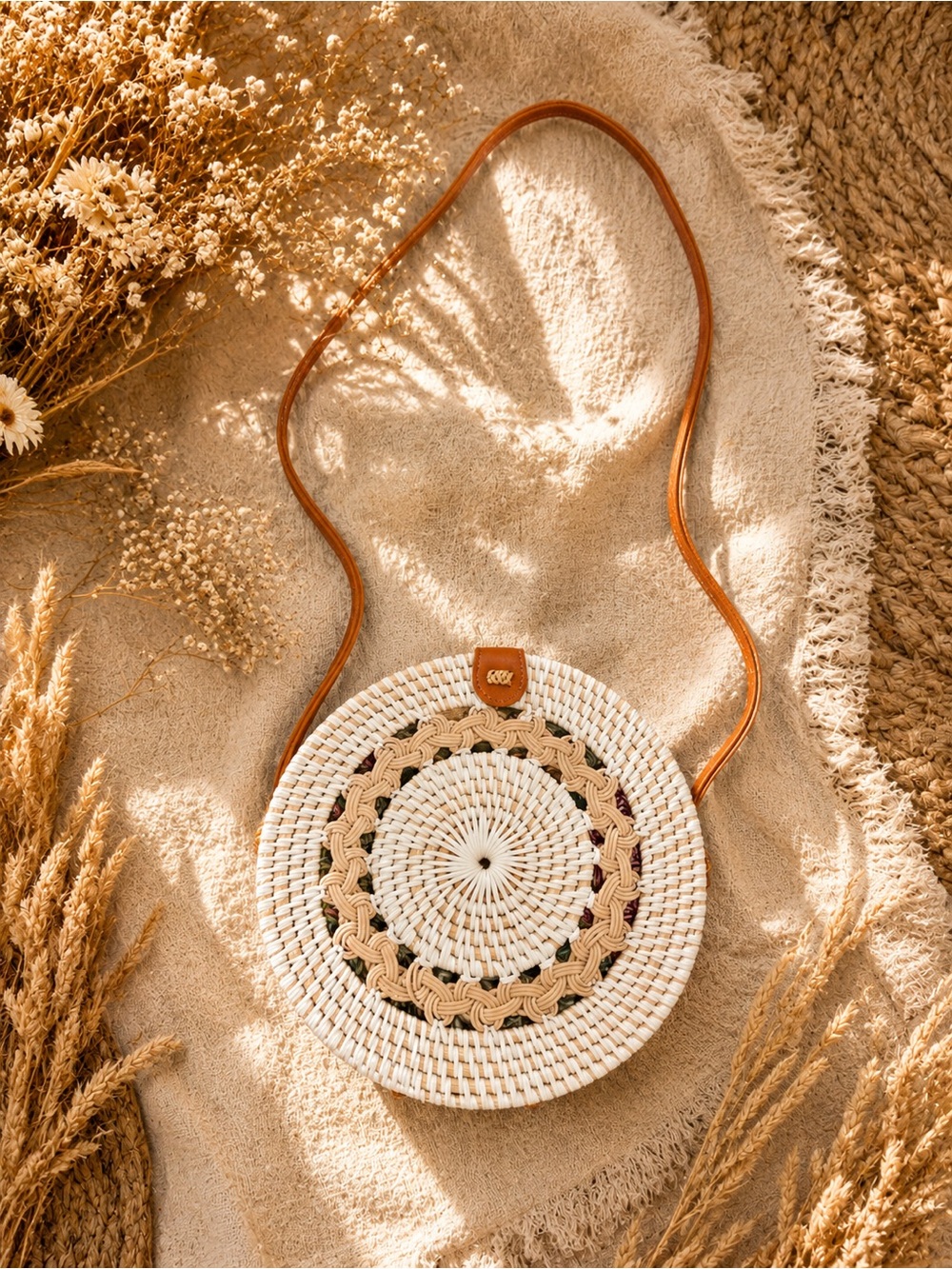 Round Woven Crossbody Bag in Natural and Tan